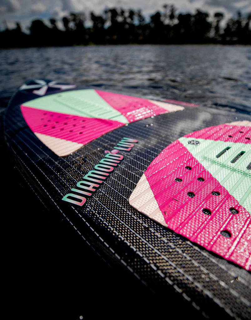 A pink and black Phase 5 Diamond Luv stand up paddle board.