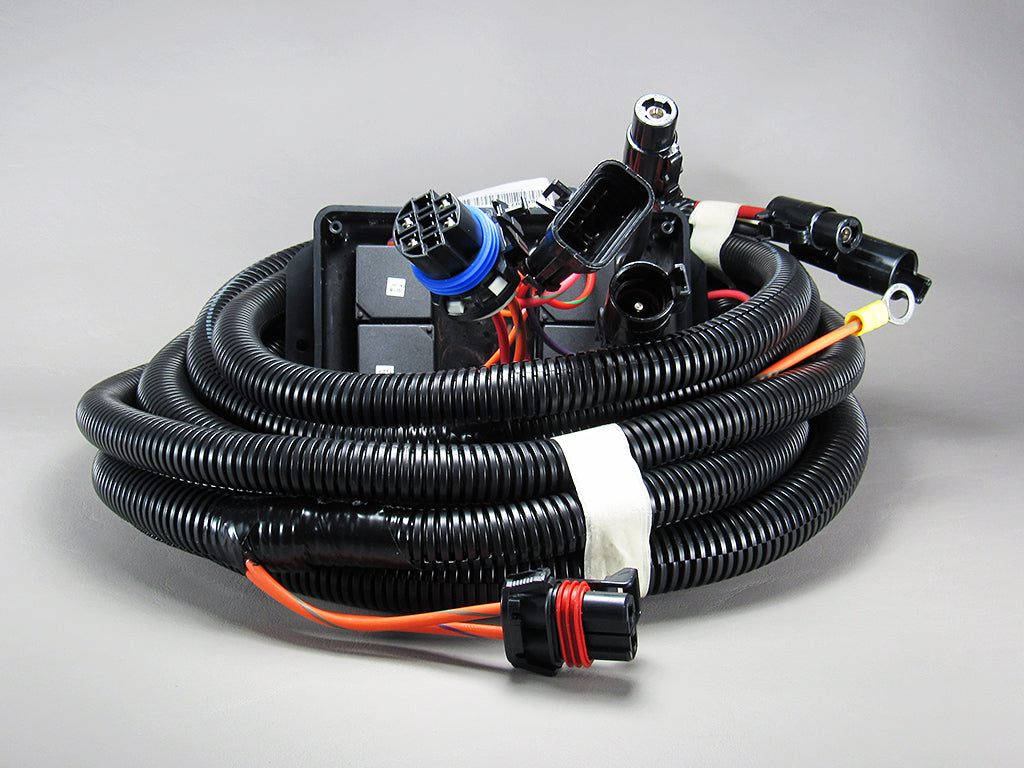 An Axis 4-Pack Module Surf Gate Relay Rev1 ’16 wiring harness, featuring black coils with orange and blue wires, connectors, plugs, and surface mount breakers, is secured with white tape and marked 6174048.2 for identification.