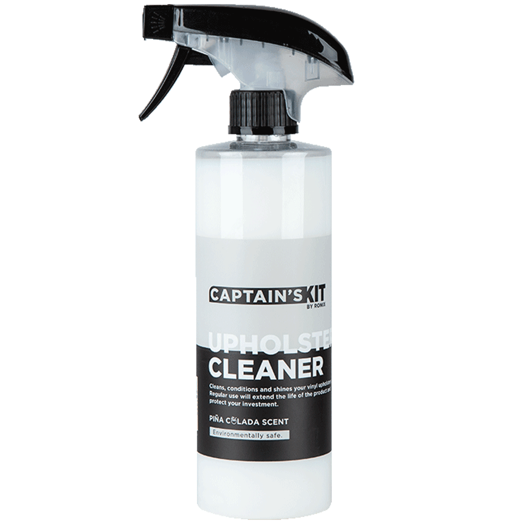 A 16oz spray bottle of Ronix Captain's Kit Upholstery Cleaner with a black trigger and label, featuring a pina colada scent and an environmentally safe formula.