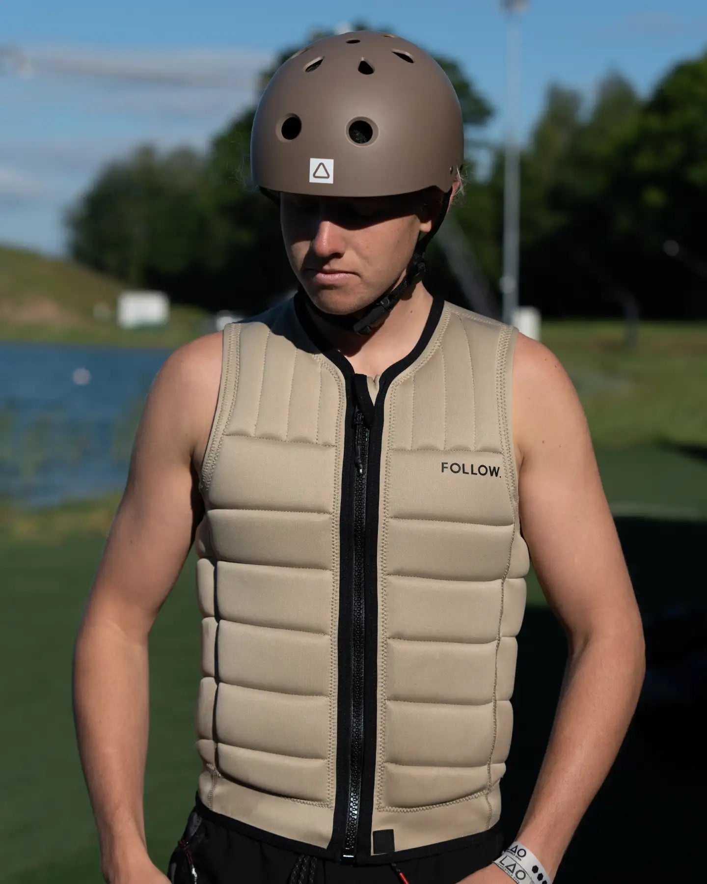 Gavin Stuckey poses in the Follow Total Men's Impact Vest - Sand