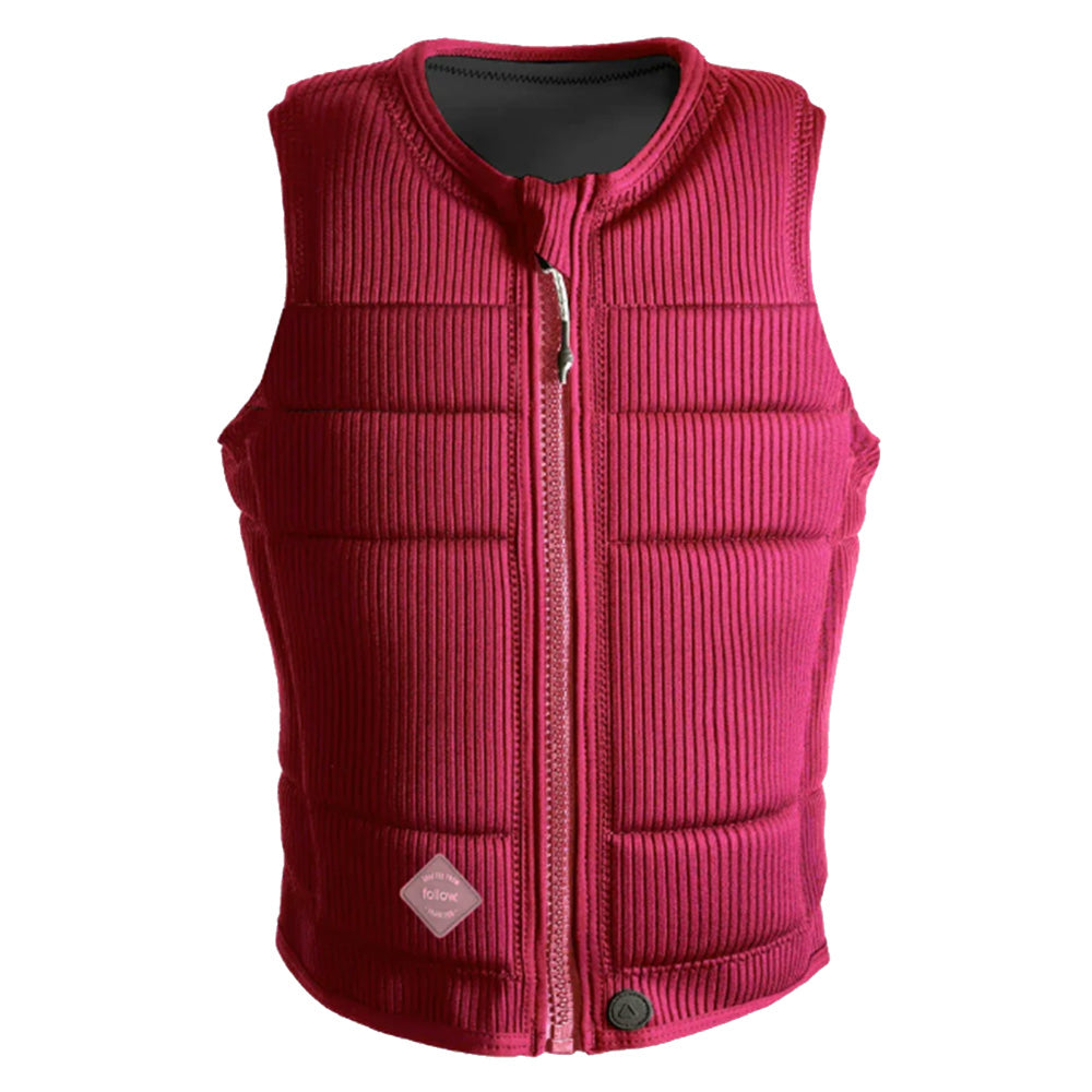 The Follow Wake Cord Ladies Jacket in maroon is a sleeveless, zip-up vest made from ribbed corduroy neo fabric with padded sections, a diamond logo near the hem, and a comfortable TrueFit Liner.