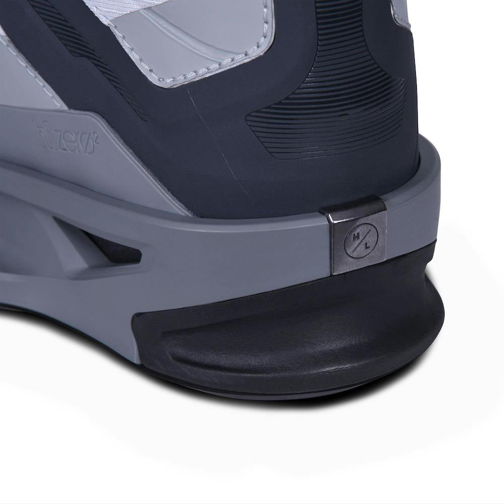 Close-up of the Hyperlite Zero02 Boot 2026 heel, an ultra-lightweight gray and black wakeboarding boot from Hyperlite, with a round M/L dial and a geometric-patterned sole.