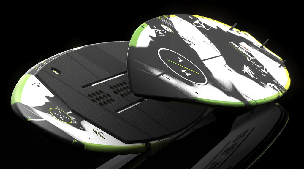 The Hyperlite Broadcast Wakesurf Board 2026 boasts a dual concave base and textured surface, with black, white, and neon green accents on a black background that highlight its fins and bold Hyperlite branding.