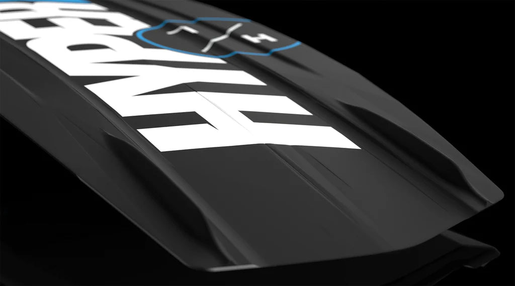 Close-up of the Hyperlite State 2.0 Wakeboard 2026 by Hyperlite, featuring a sleek black asymmetrical design, bold white HYPER branding, and a blue and white H logo, all set against a black background.