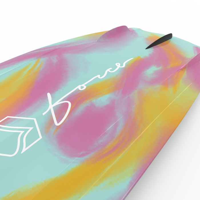 The Liquid Force 2025 Angel Wakeboard with Plush 6R Bindings showcases a vibrant design of pink, yellow, and teal swirls, complemented by a white logo and signature.