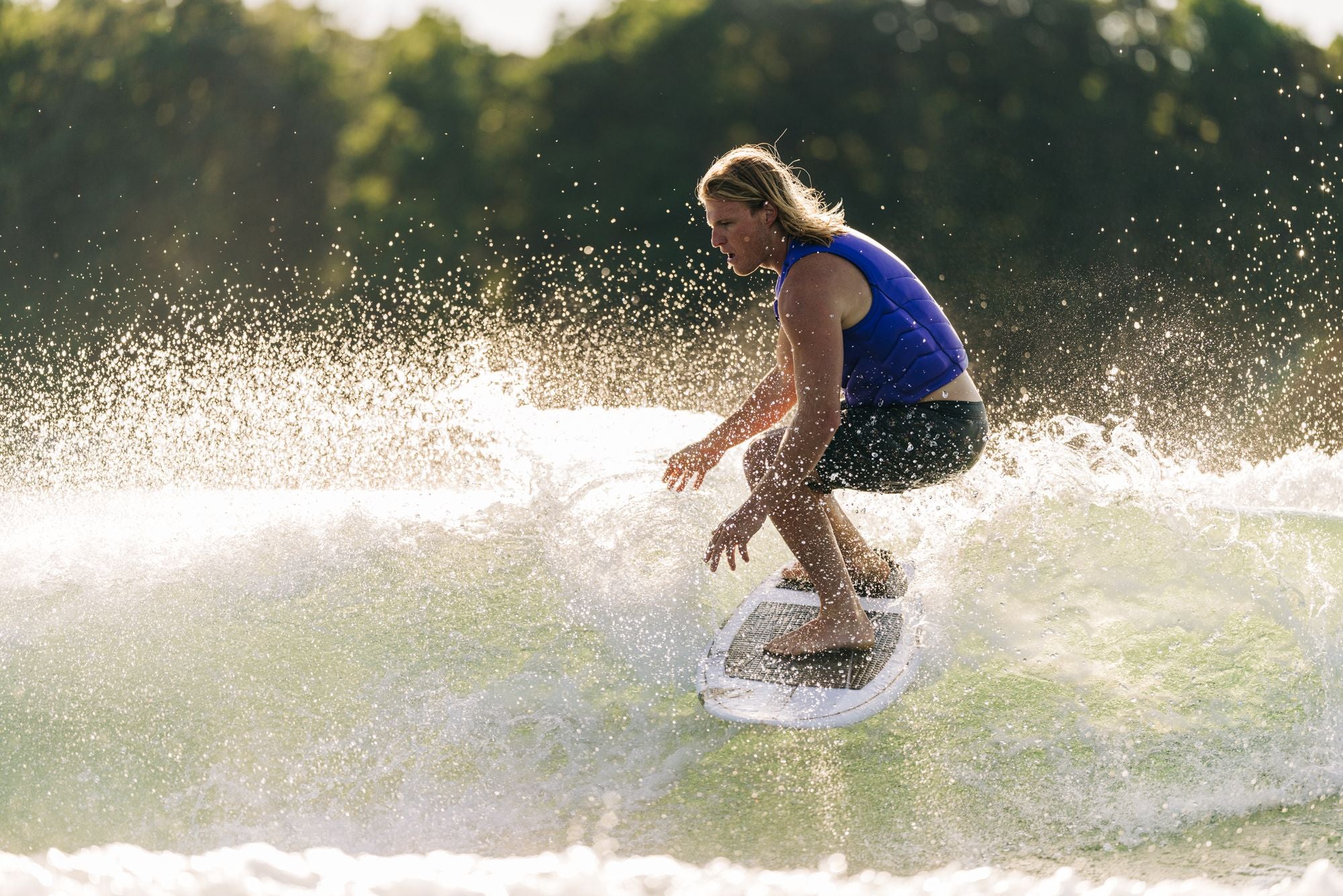 Liquid Force 2025 Flyer Wakesurf Board Luca Kidd slashes off the top of the wakesurf wave