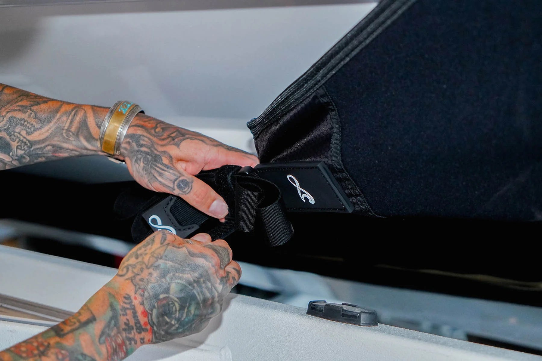 Surfinity Boat Shield tie down straps shown in action