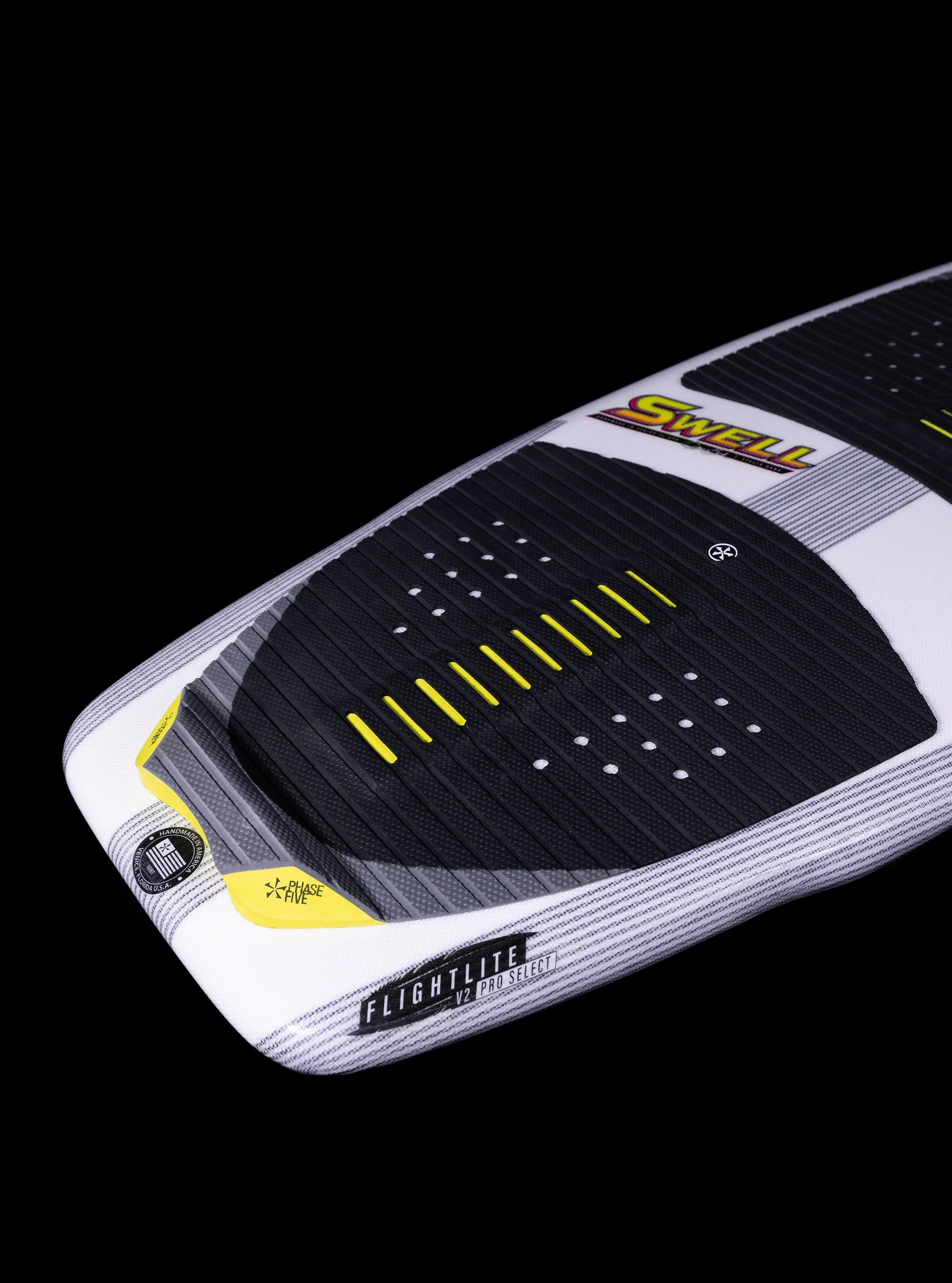 Phase 5 2025 Swell Wakesurf Board tail featured against a black back drop