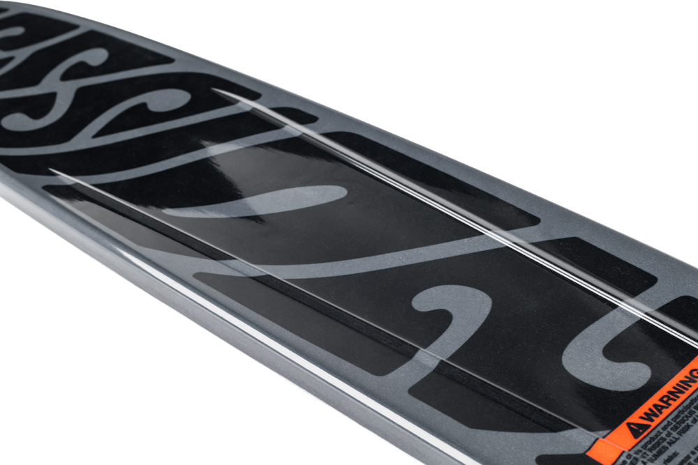 Close-up of the tip of a Radar Session Waterski | Prime + ARTP 2026 by Radar, featuring black and gray stylized lettering, a visible warning label, and a glossy, premium finish.