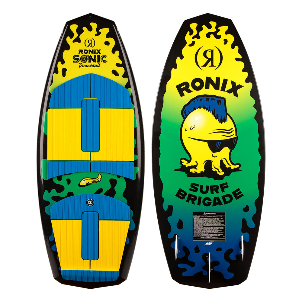 Two Ronix Sonic Powertail Wakesurf Boards 2026 (3'9") are shown: one side shows blue, yellow, and green traction pads; the other features a cartoon fish with sunglasses and "RONIX SURF BRIGADE" on a green-yellow gradient.