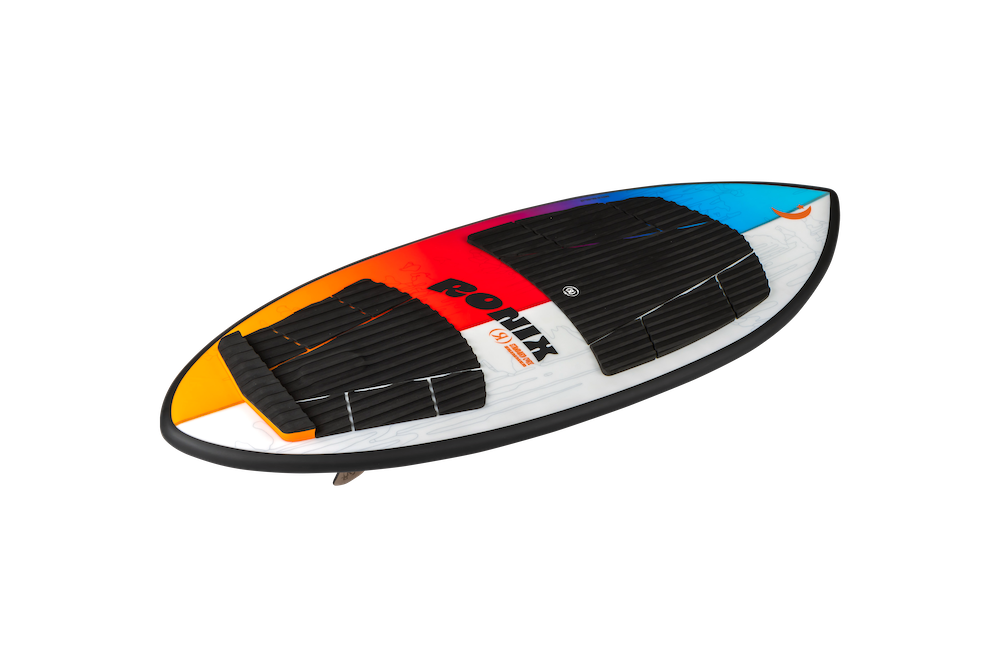 The Ronix Standard Core Skimmer 2026 skimboard features a black traction pad with yellow, orange, red, blue, and white accents—perfect for beginner to intermediate wakesurfers—and is shown on a plain white background.