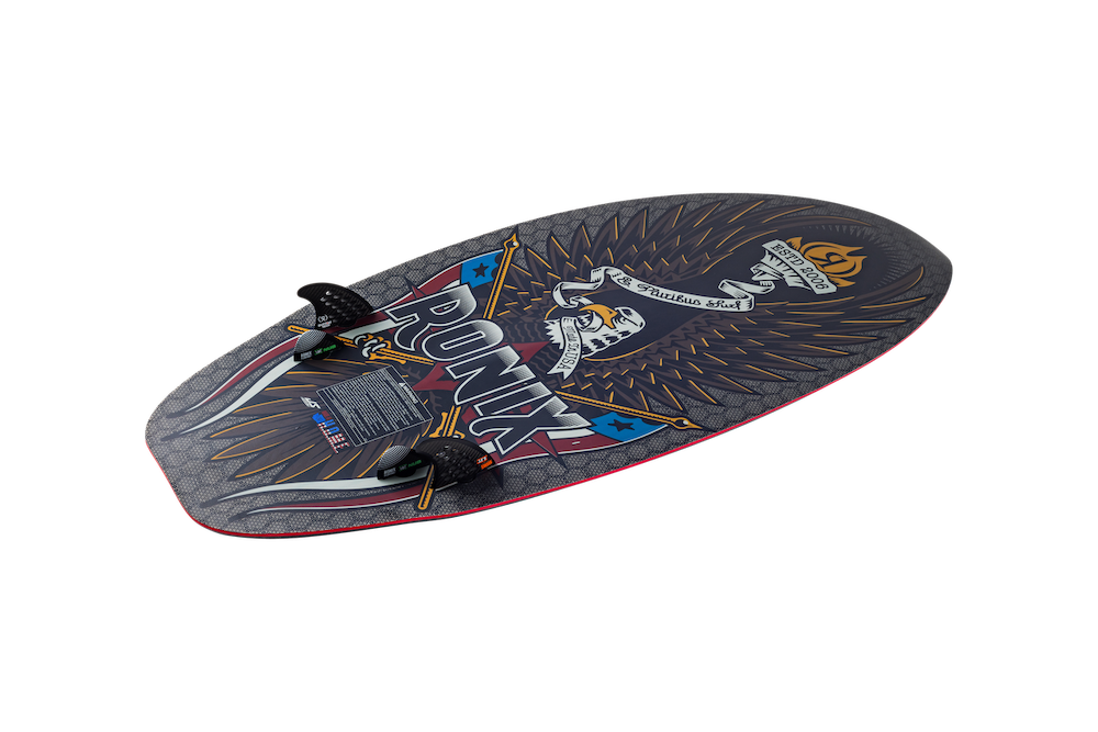 The Ronix M50 Dark Matter Wakesurf Board 2026 features bold graphics, including a stylized eagle, banner, and stars. Its universal shape, two black fins, and textured gray surface with colorful accents offer versatile performance.