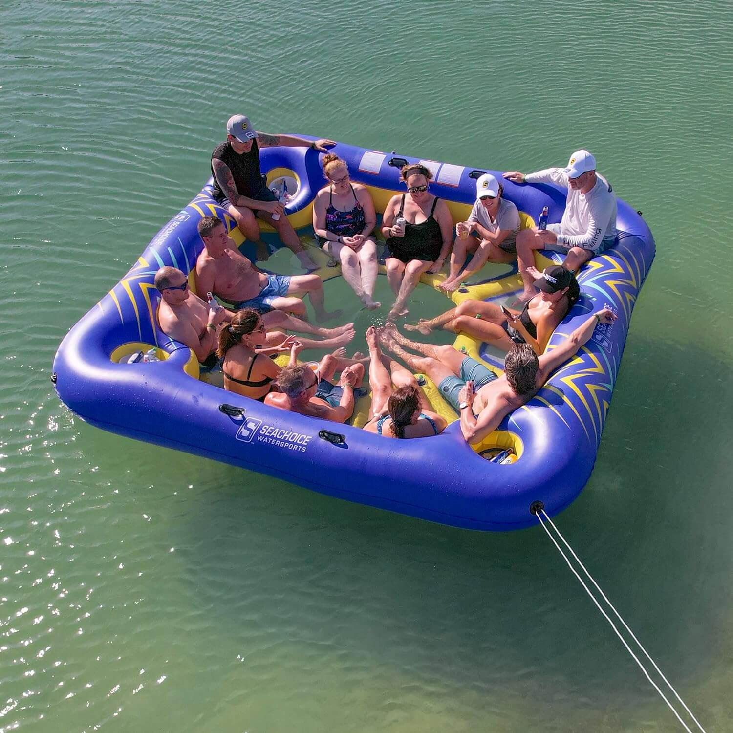 12 people hanging out on a party float made by seachoice