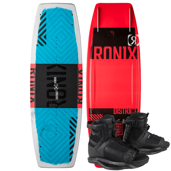 Two Ronix 2025 Kid's District Wakeboards, featuring a hybrid rocker for explosive jumps, sit side by side—one red and one blue—with Divide bindings in front.