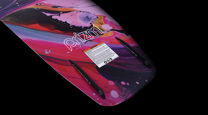 A pink and purple Hyperlite surfboard with a black background. The Hyperlite 2024 Prizm Wakeboard | Womens Viva Bindings features stunning colors and is perfect for riding waves or practicing wakeboarding tricks.