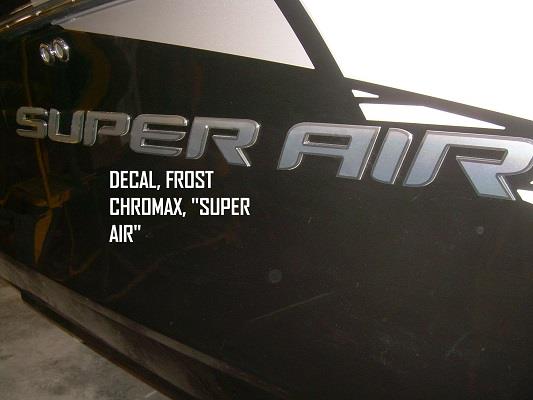 Close-up of a black and white boat featuring a large Nautique DECAL FROST CHROMAX SUPER AIR (130086) on the side. Text overlay: DECAL FROST CHROMAX SUPER AIR. Brand: Nautique.