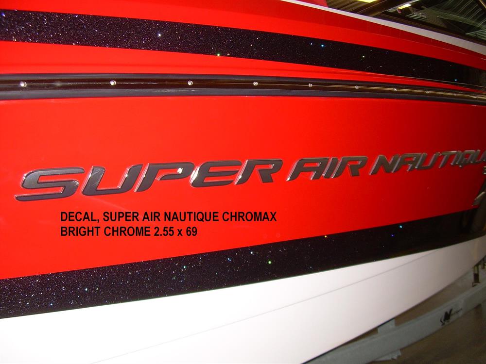Close-up of a red and black boat with shiny silver Nautique DECAL SUPER AIR NAUTIQUE CHROMAX BRIGHT CHROME 2.55 x 69 - 140014 on the side. Brand: Nautique.