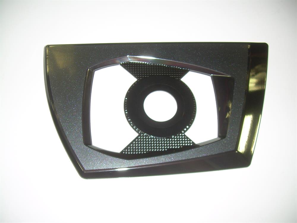 The Nautique DECAL ROTARY ENCODER CHROMAX BLACK 7.74 X 4.51 - 170105 is a black, rectangular trim piece with a central hole for a rotary encoder and a textured pattern, shown on a white background. Brand: Nautique.