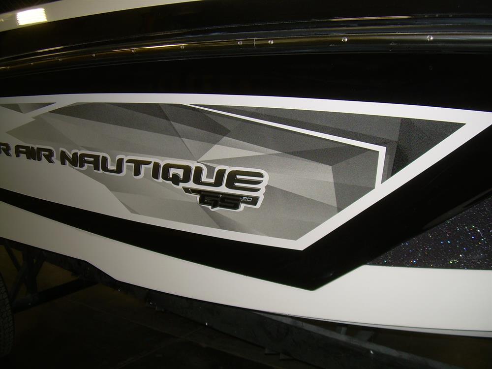 Close-up of Nautique DECAL GALAXY HULLSIDE GRAPHICS GS20 (170214) showing the geometric "Super Air Nautique" logo, "GS20" chrome lettering, and striking black, white, and gray color scheme on the boat's side panel.