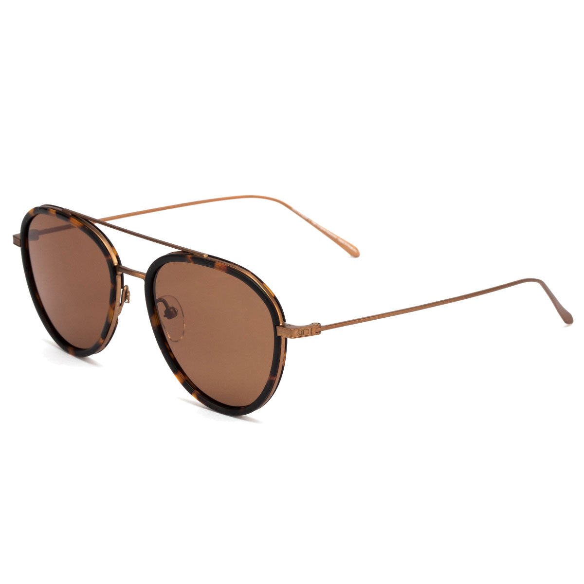 The Otis Templin sunglasses in Matt Havana Tort/Brown Polar feature round mineral glass lenses, thin gold arms, a tortoiseshell frame, and offer 100% UVA/UVB protection, shown on a white background.
