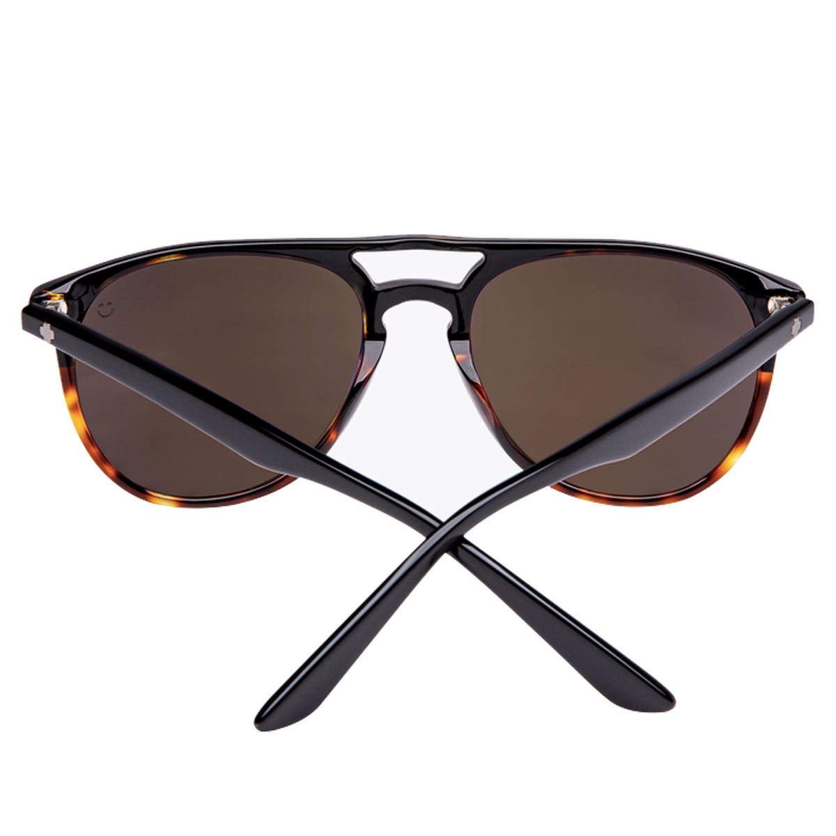 The Spy Syndicate sunglasses in Black/Tort feature aviator-style acetate frames, dark Happy Bronze Polar lenses, tortoiseshell arms, and provide reliable UV protection. Shown from the back with crossed arms.