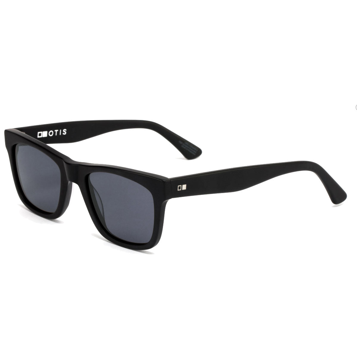 Otis Hawton Matte Black/Grey Polar sunglasses feature square matte black acetate frames, mineral glass lenses, and a white OTIS logo on the left arm near the hinge for a simple, modern look.