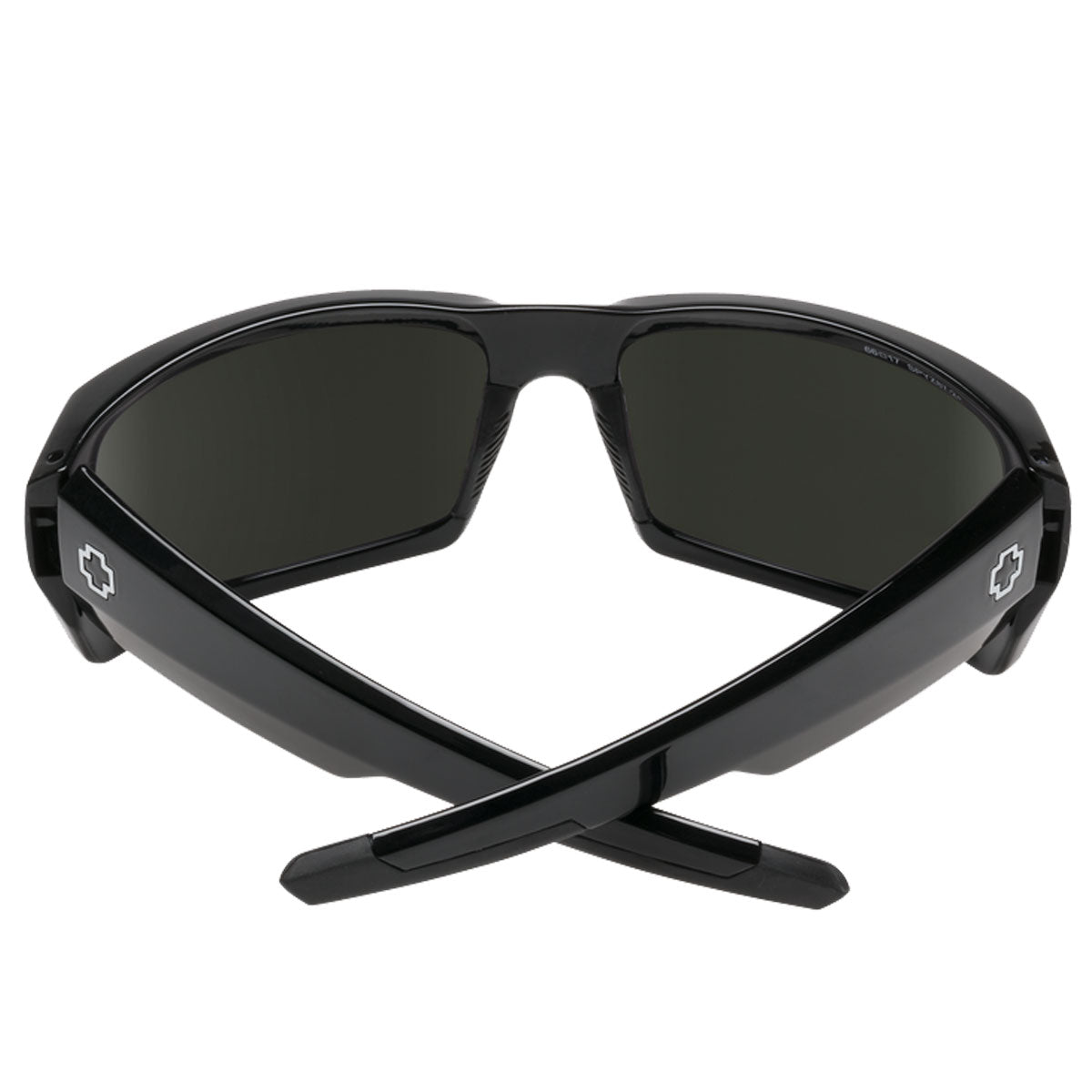 Spy General sunglasses by Spy in Black / Happy Gray Green are shown from the back with crossed arms. They feature dark polarized lenses with UV protection and a small white cross symbol on the temples.