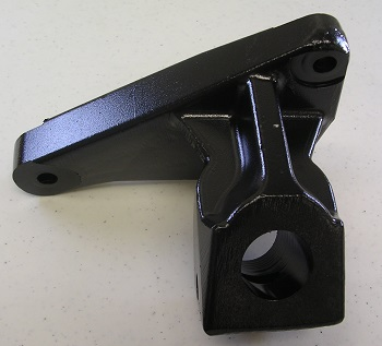 The Indmar MOUNT ENGINE 6.2L FORD BANK 2 SIDE - 535911E is a black metal bracket with a large circular hole and two smaller holes, ideal for mounting or support on Indmar 6.2L Ford engines.