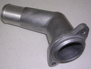 The Indmar HOUSING THERMOSTAT FORD 6.2 - 592085 is a metal pipe with a flange and mounting holes on one end, bent at an angle, designed for use in Ford 6.2 or Indmar engines. Brand: Indmar.