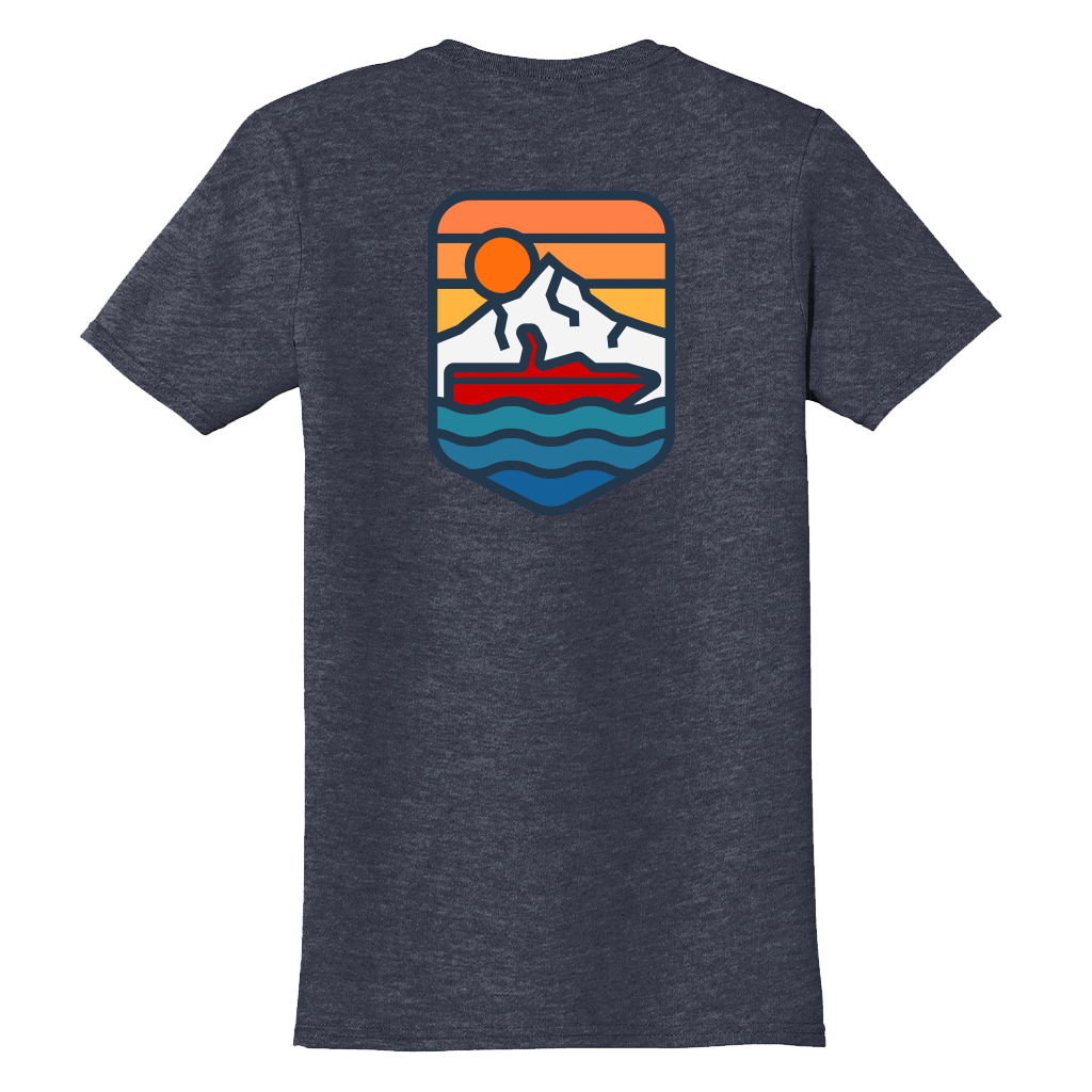 The Oregon Boater Tee – Navy by ActiveWake showcases a Mt. Hood Boatscape: a red canoe on blue waves beneath a white mountain, orange sun, and striped sky—perfect for any Oregon boater.