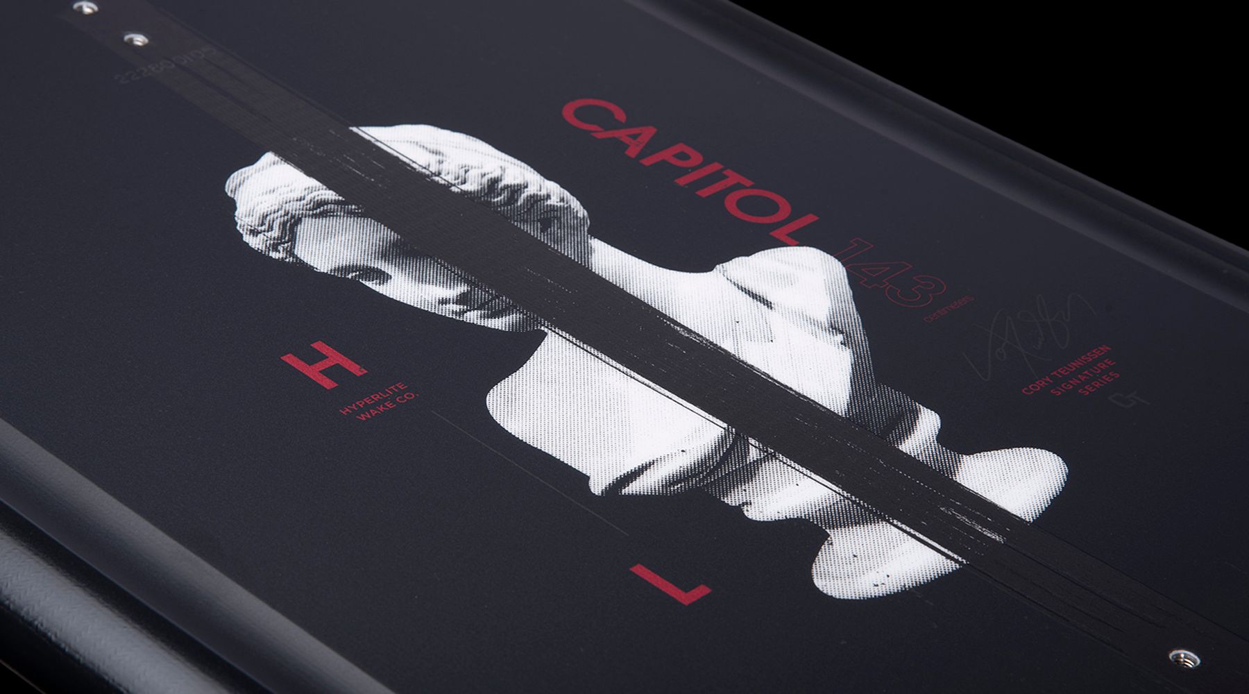A black Hyperlite 2023 Capitol Wakeboard adorned with an image of a bust.
