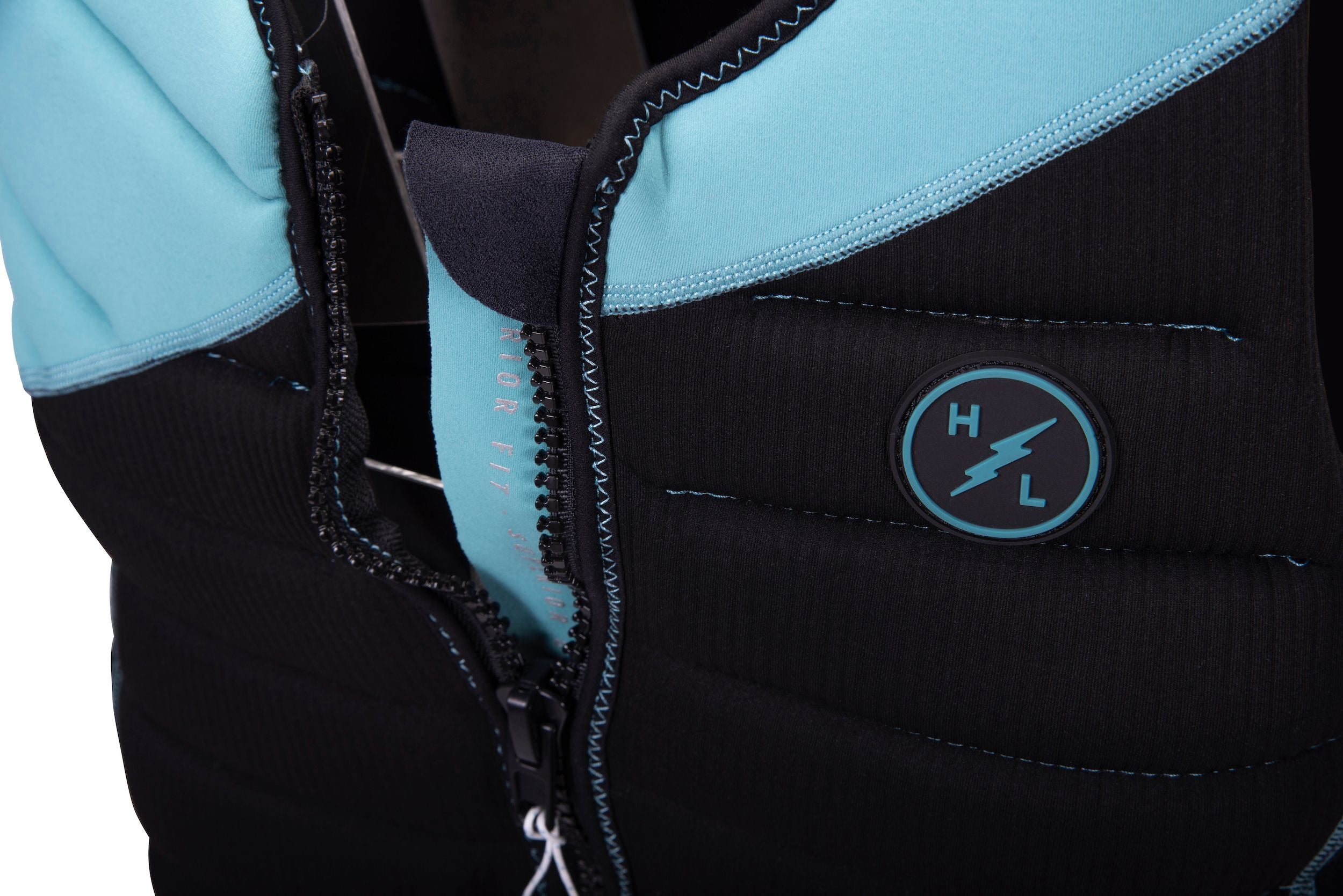 A Hyperlite women's storm jacket with a lightweight construction and a blue and black zipper.