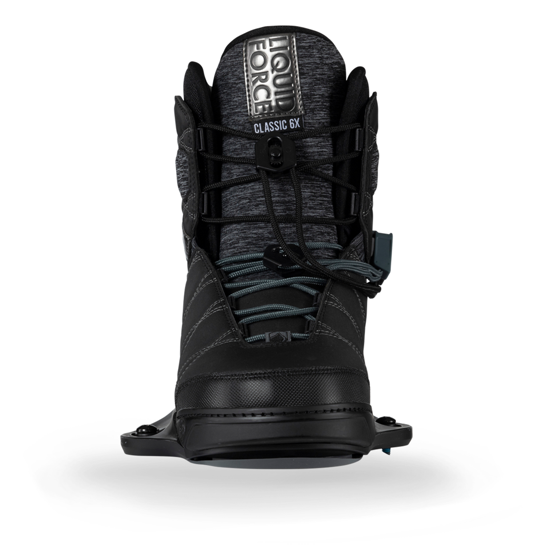A pair of comfortable Liquid Force 2024 Classic 6X ski boots with binding on a white background.