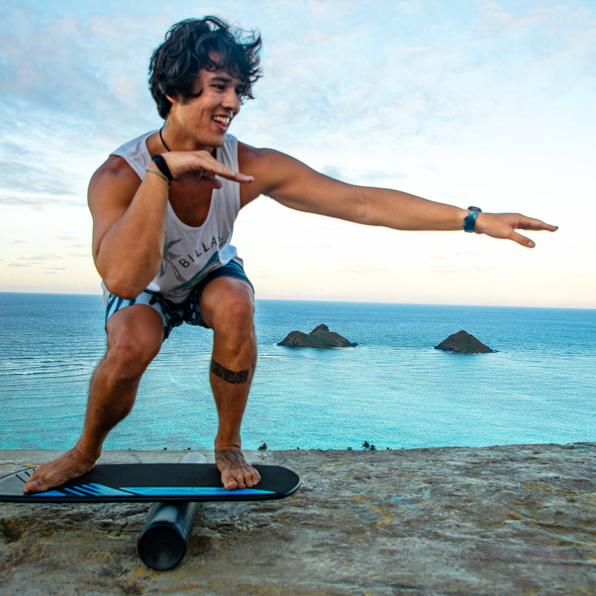 A man effortlessly glides on a Revolution Swell 2.0 Balance Board, displaying amazing balance and control.