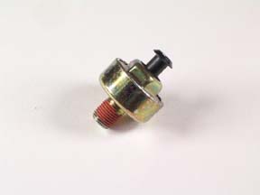 A close-up of a metal bolt, typically found near the Indmar SENSOR KNOCK - 556015 PCM R020027 on Indmar 5.7 L engines.