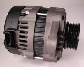 A close-up of the Indmar ALTERNATOR 95 AMP SERP. GM - 575014 shows the metal casing, cooling vents, cylindrical shape, pulley, and electrical connector from Indmar, designed for GM engines against a plain background.