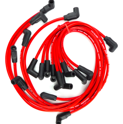 The Indmar Spark Plug Wire Set 5.7 L - 756002 features red wires with black boots, coiled on a white background—perfect for 5.7L engines with a Delco EST distributor. Brand: Indmar.
