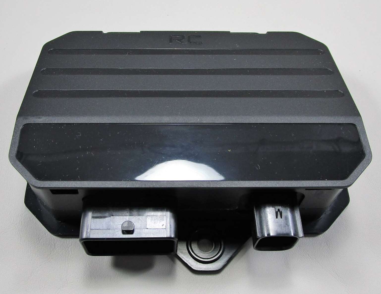 A rectangular black Malibu Power Module (2021+, #3961031) with ridged top lines and dual connectors sits on a light gray surface, labeled SG/PW Control and compatible with OEM Relay Driver or PM2 systems.