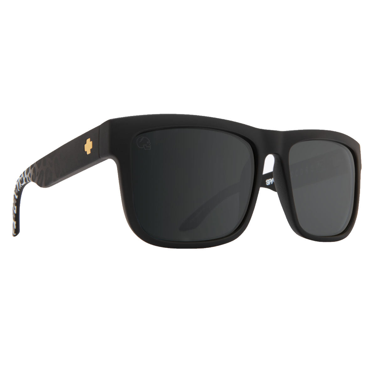 Spy Discord sunglasses in Matte Black Leopard Fade feature HD Plus Gray Green Silver Light Spectra lenses, durable Grilamid® frames, a subtle temple texture, and a small silver cross detail on the side.