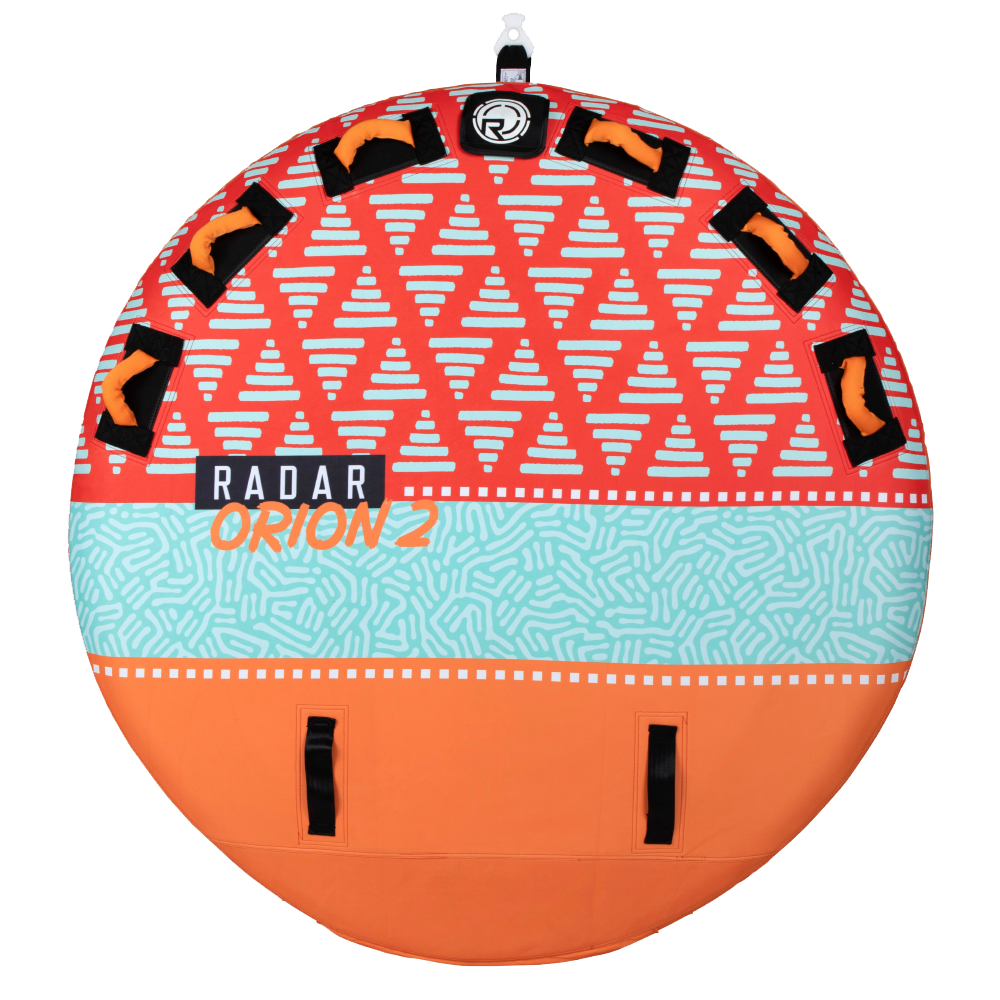 The Radar Orion 2 Person Tube is a round inflatable water tube adorned with orange, turquoise, and red geometric patterns. It features multiple black handles set against a yellow background and offers added comfort with its Marshmallow Soft Top for your aquatic adventures.