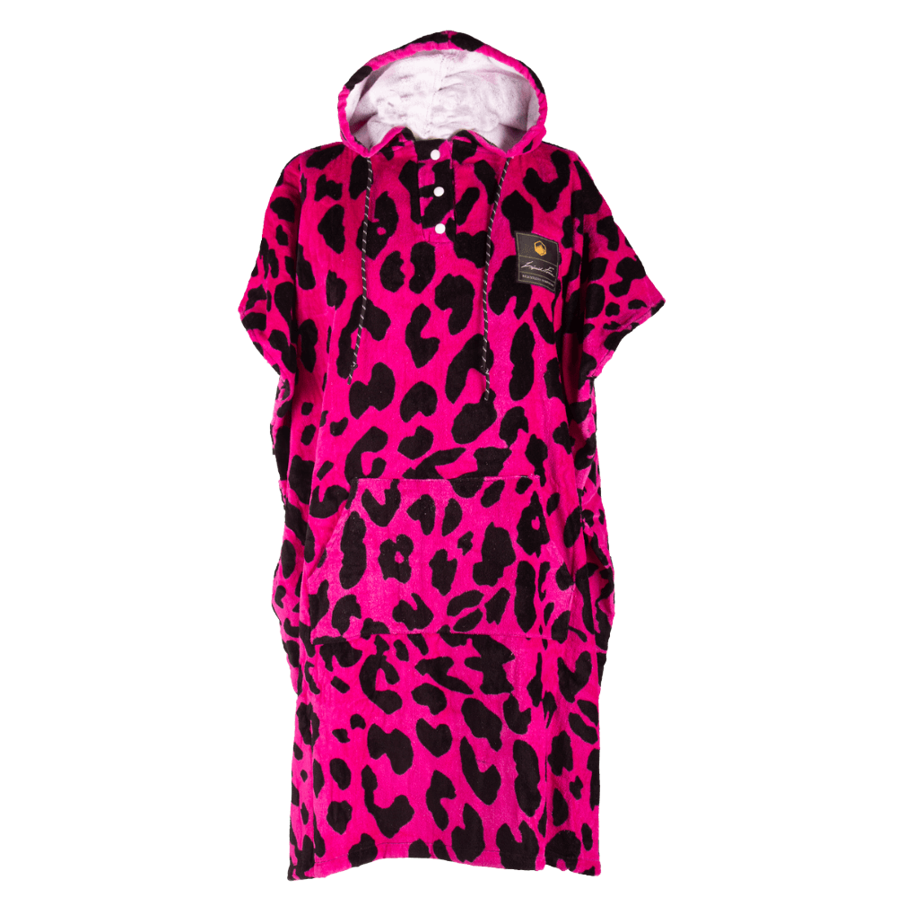The striking Liquid Force Punk Changer towel showcases a vibrant pink leopard print in a hooded poncho style, accented with a front pocket and a discreet logo patch, making it the perfect gift for those with an eye for fashion.