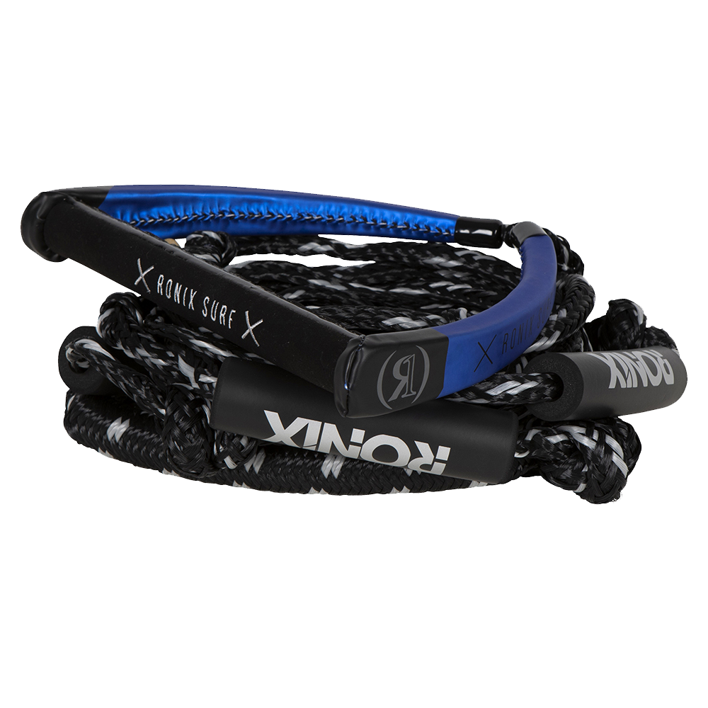 The Ronix PU Syn. Bungee Surf Rope 25ft 4-Sect features a coiled black and white rope and a blue and black memory foam handle with "RONIX" and "RANCH SURF" on the grip, shown on a plain white background.