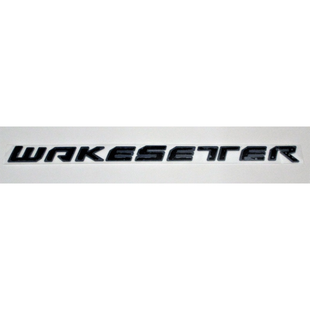 The Malibu Wakesetter Hull Decal, 32" (Black) by Malibu features a bold black and silver 3D-style "WAKESETTER" logo on white, ideal for adding standout style to your boat.