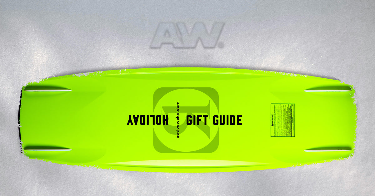2023 Watersports Holiday Gift Guide, 2 wake boats on the water palm trees in the background