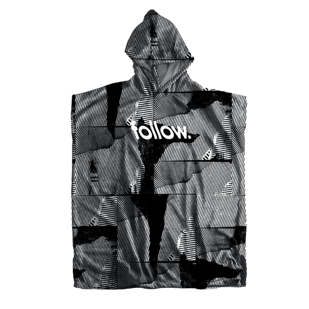 A black and white hooded poncho embroidered with the word "wolf" on it, called the Follow 3.13 Pop Towelie by Follow Wake.