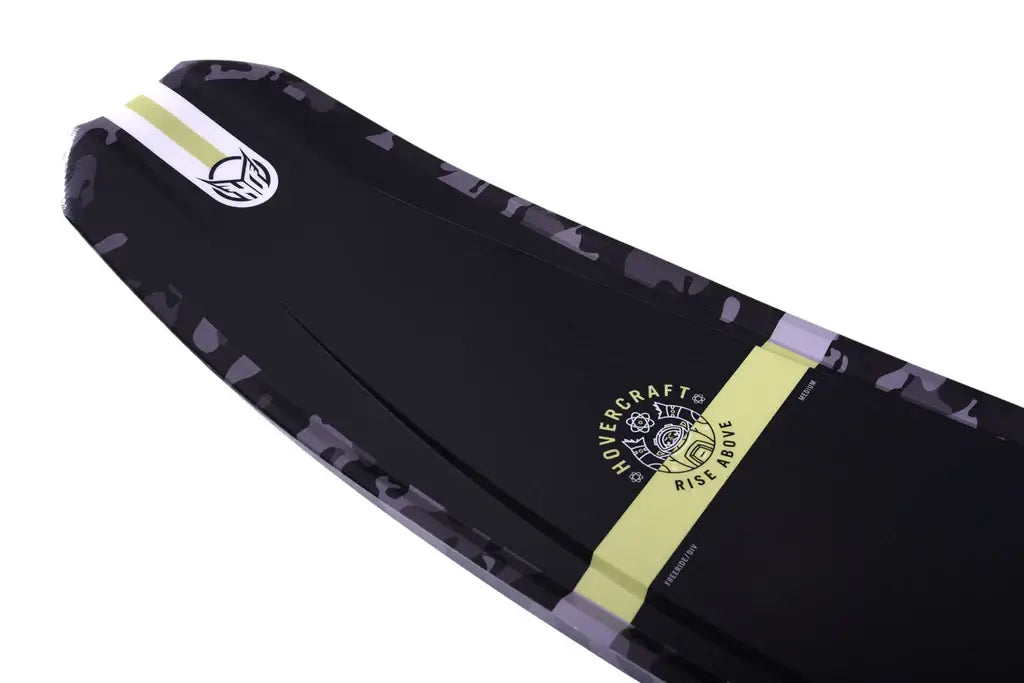 Close-up of a snowboard in Fluro Camo with black, yellow, and white accents, featuring the words "Hovercraft" and "Rise Above." Designed by HO Sports, this Stance 110 model is perfect for those wanting to elevate their riding experience.