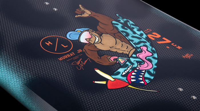 The back of a skateboard with a cartoon character, featuring the Hyperlite 2024 Murray Jr. Wakeboard | Remix Boy's Bindings model.