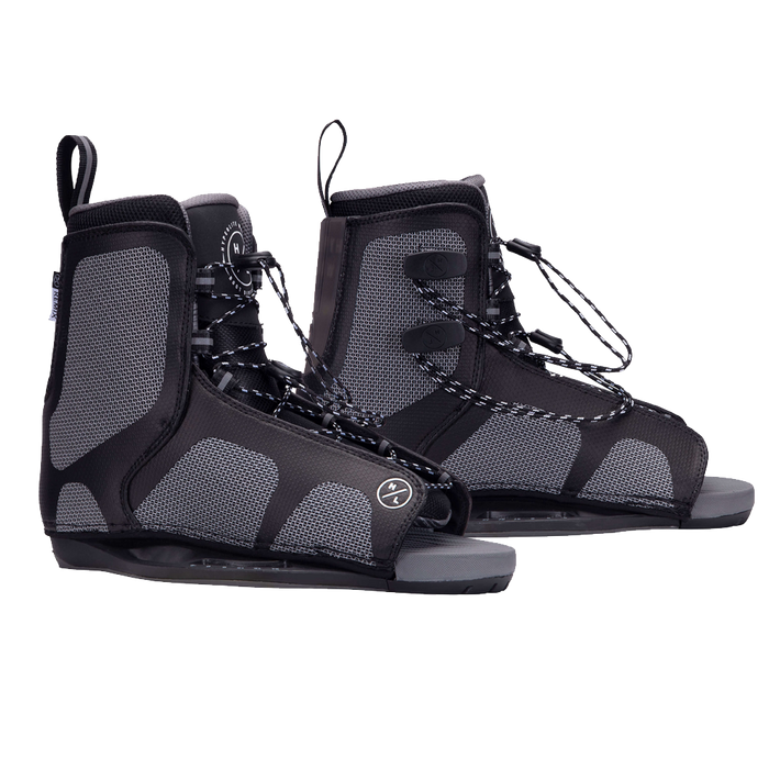 A pair of comfortable black and grey wakeboard boots featuring the Hyperlite 2024 Motive Jr. Wakeboard and Remix Bindings.