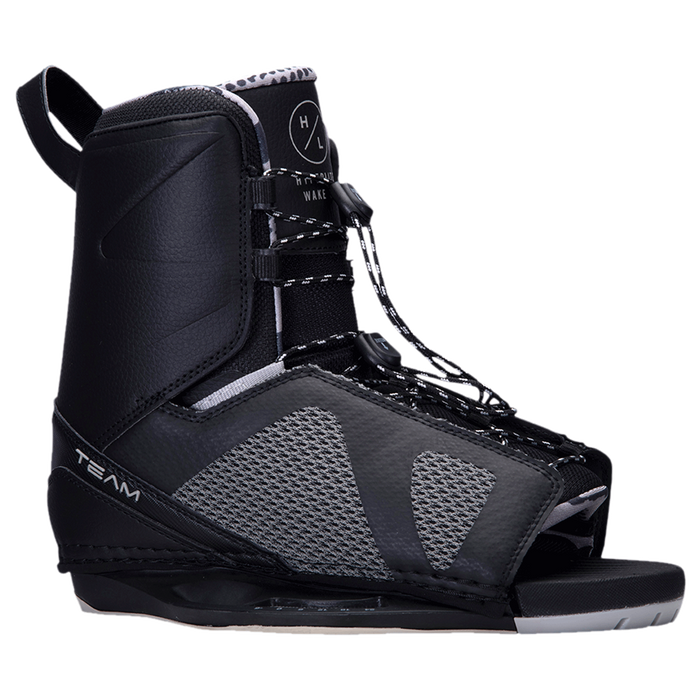 A pair of black and grey ski boots on a white background featuring the Hyperlite 2024 Rusty Pro Wakeboard and Team OT Bindings.