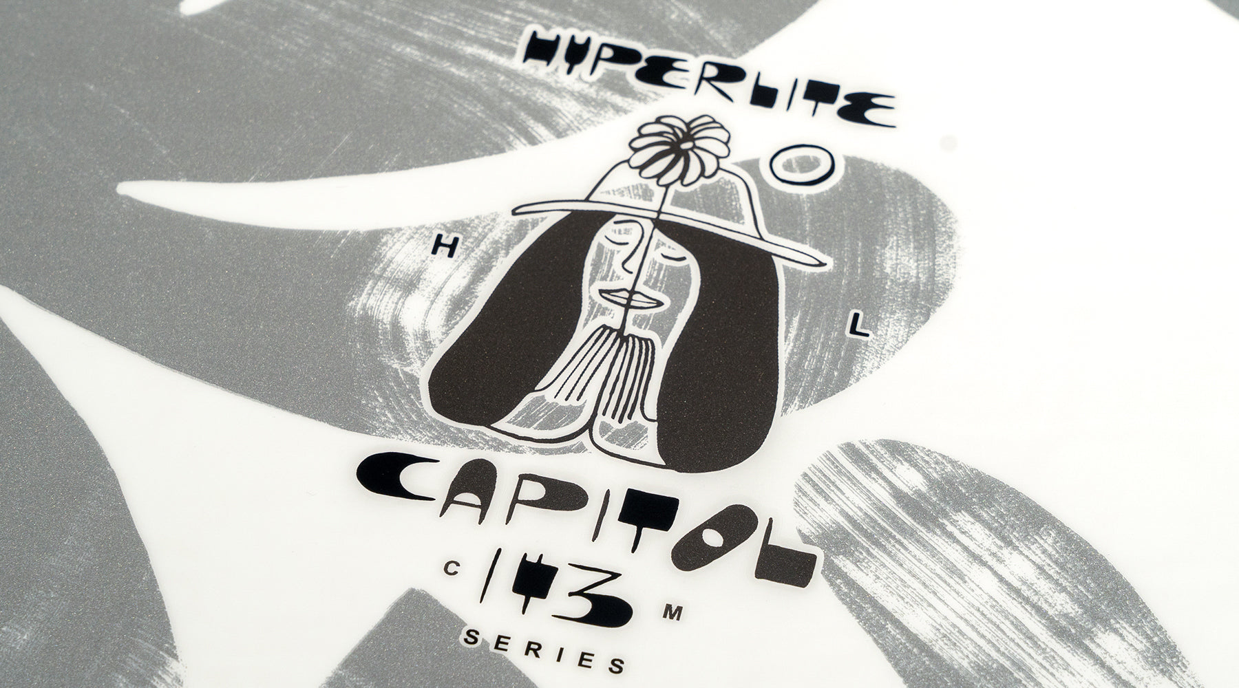 Artistic graphic showcasing the text Hyperlite 2025 Capitol Wakeboard, accompanied by an abstract figure in a hat, emphasizing its cutting-edge Biolite 3 Core technology.